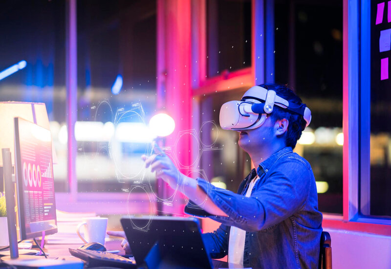 what is metaverse | Image: person wearning VR headset touching virtual screen |logic worker